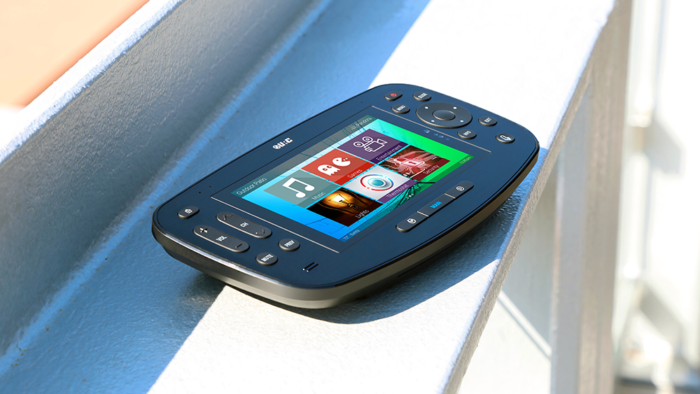 A stylish, contemporary living space showcasing the TDC-5100 integrated into a sleek home setup with modern furniture and warm, ambient lighting.